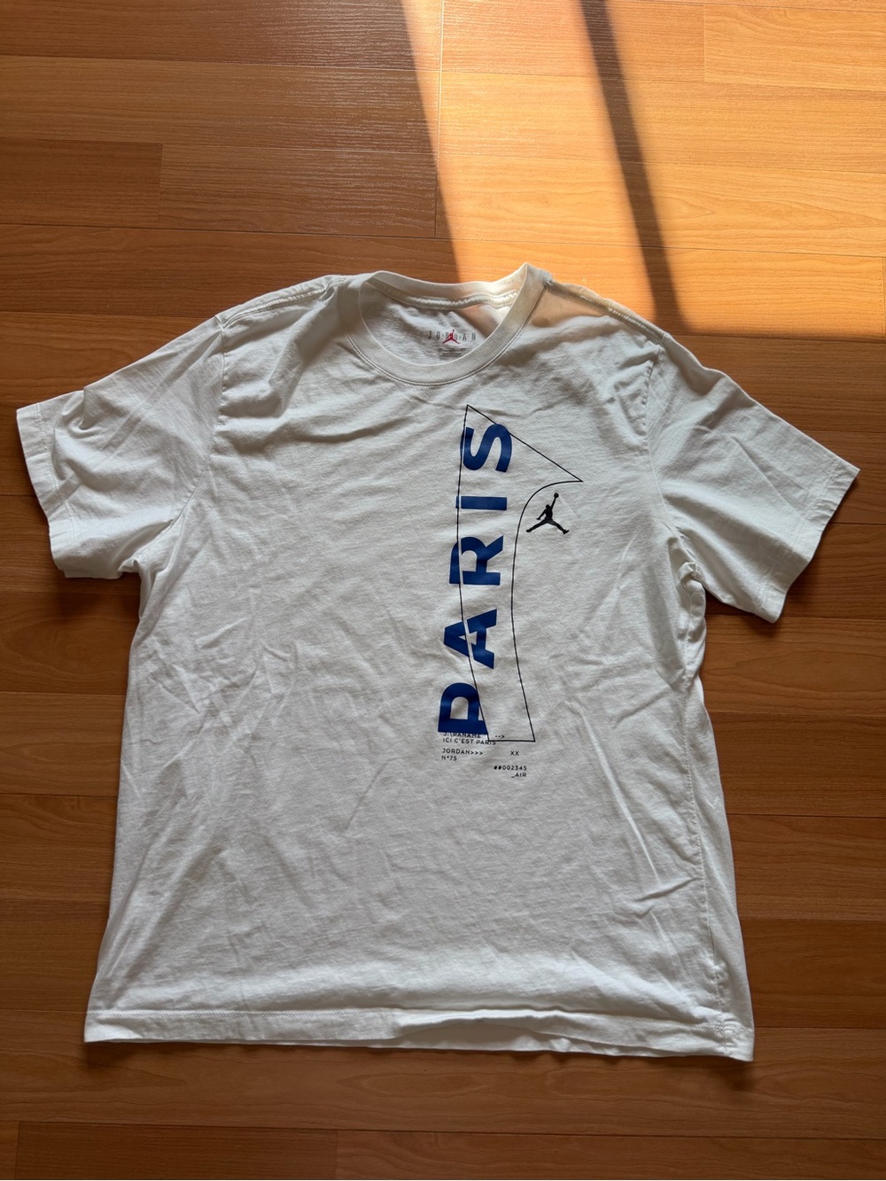 Jordan White Short-Sleeve Tee with Blue PARIS Graphic